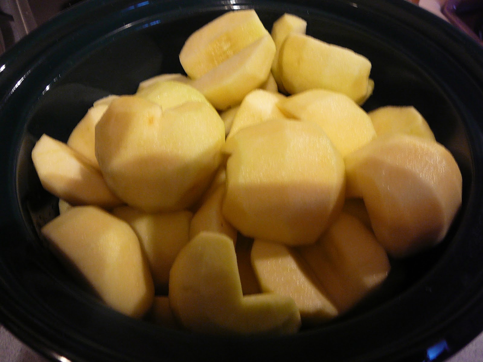 The Hidden Pantry Cinnamon Candy Apple Butter in the Crockpot.