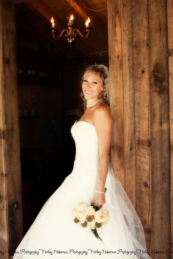 Cle Elum Backyard Wedding | Jeff and Elisia | Ellensburg Wedding Photographer photo of bride at rustic saloon