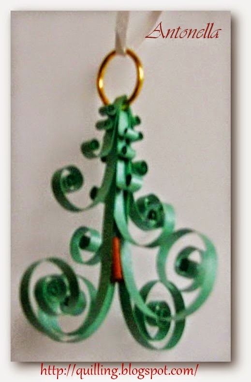 This super cute Quilled Christmas Tree ornament is easy to make. The pattern is versatile enough that you could wear it as a necklace or earrings if you wanted to.  Hop over to see what Antonella has for you at www.quilling.blogspot.com. #quilling #ornament