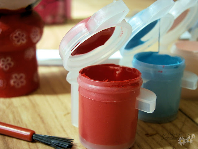 paint pots and paint brush