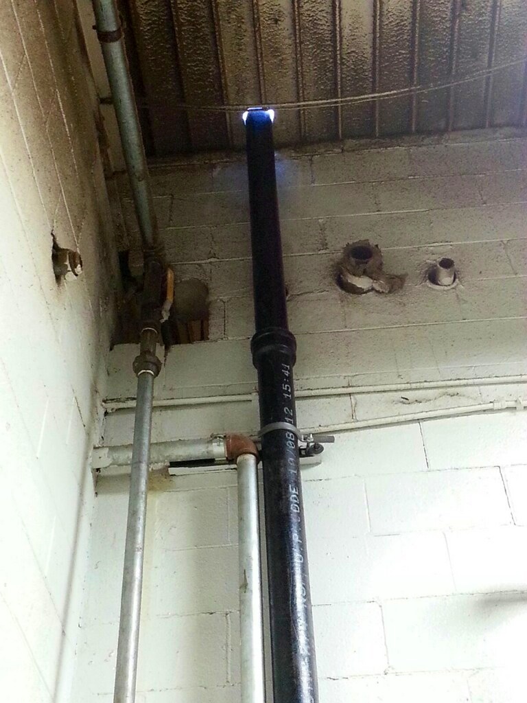 Reliance Plumbing Cast Iron Roof Drain Vent Stack Installation