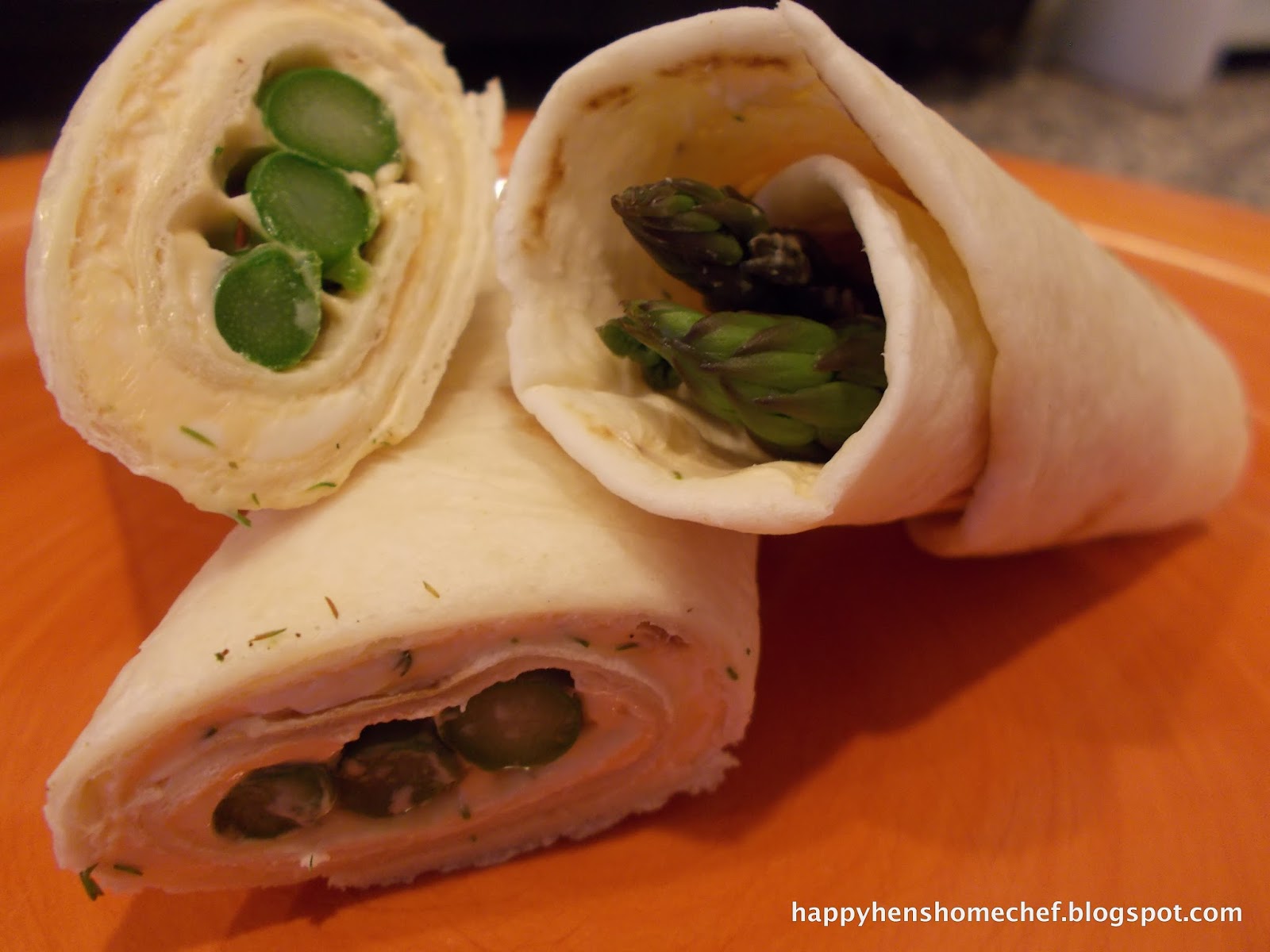 Cold cream cheese wraps with asparagus