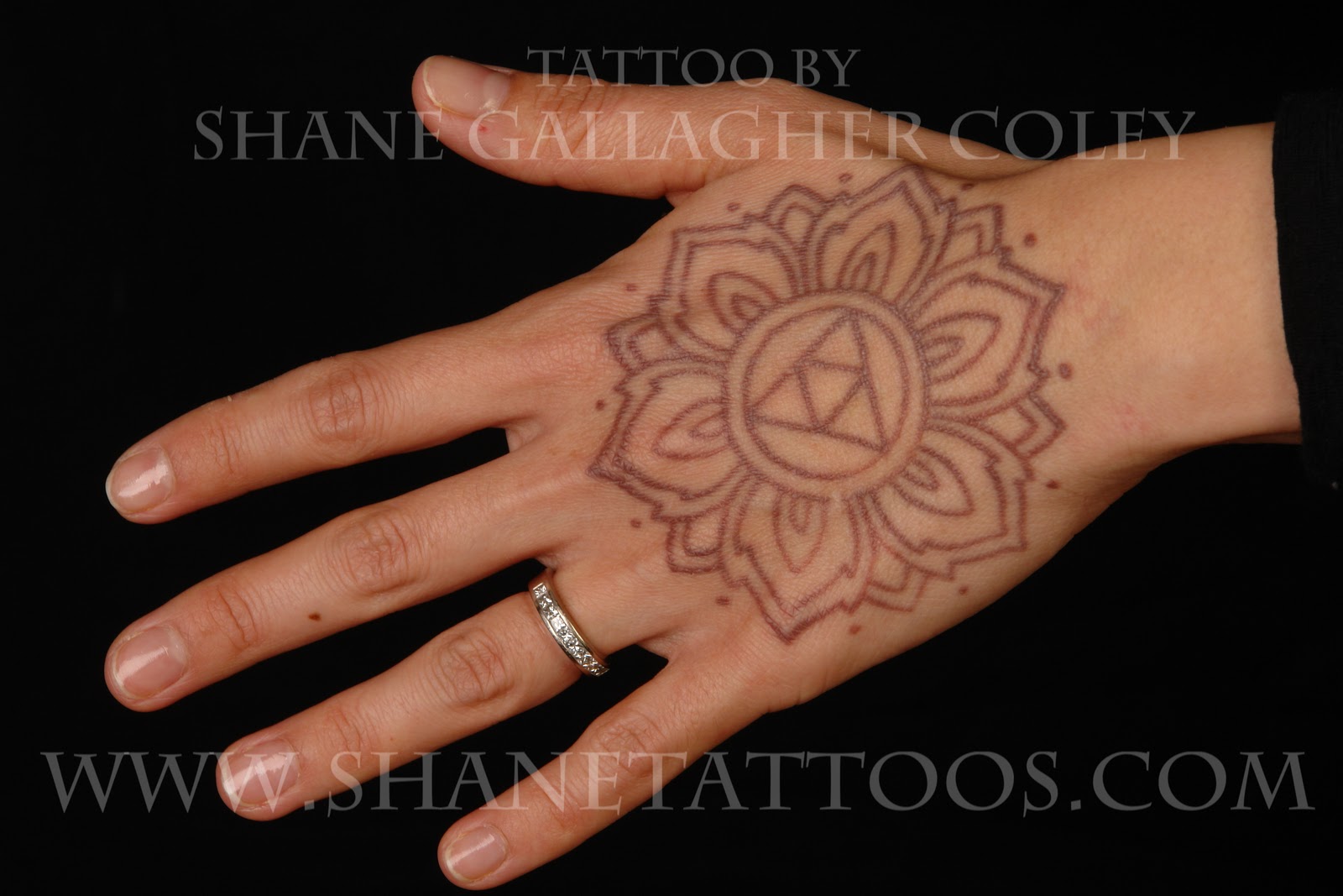 Henna Inspired Hand Tattoo on