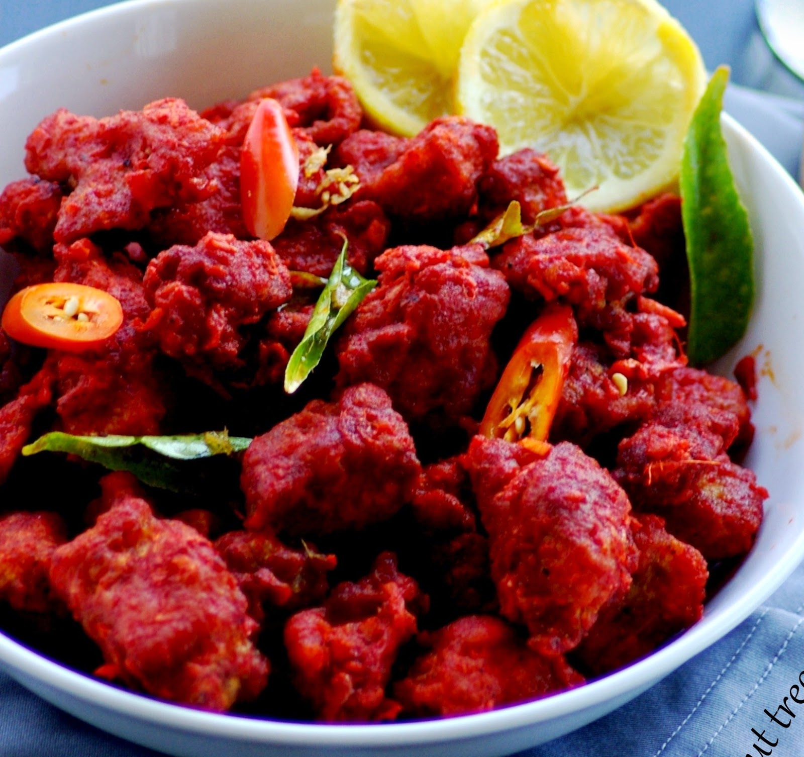 elephants and the coconut trees Chicken 65 / Spicy deep fried chicken