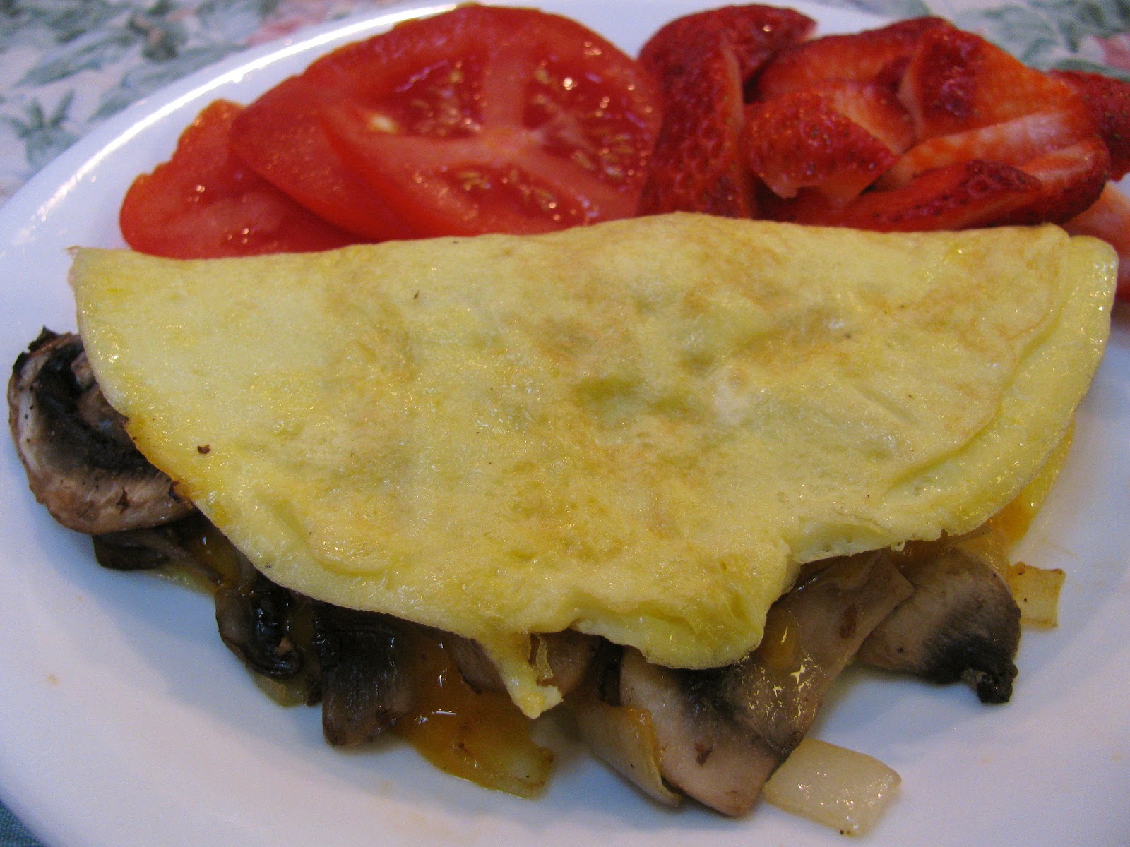 THE SPUNKY COOKIE CHEESE, MUSHROOM, SAUSAGE, & ONION OMELETTE