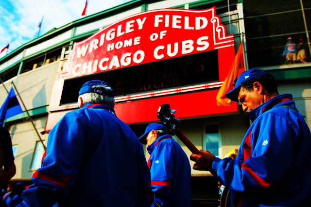 A band of super fans playing music outside of Wrigley Field.