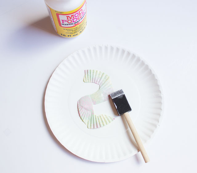Decorate a balloon with cupcake liners - so fun! Decorate a balloon with cupcake liners - so fun!