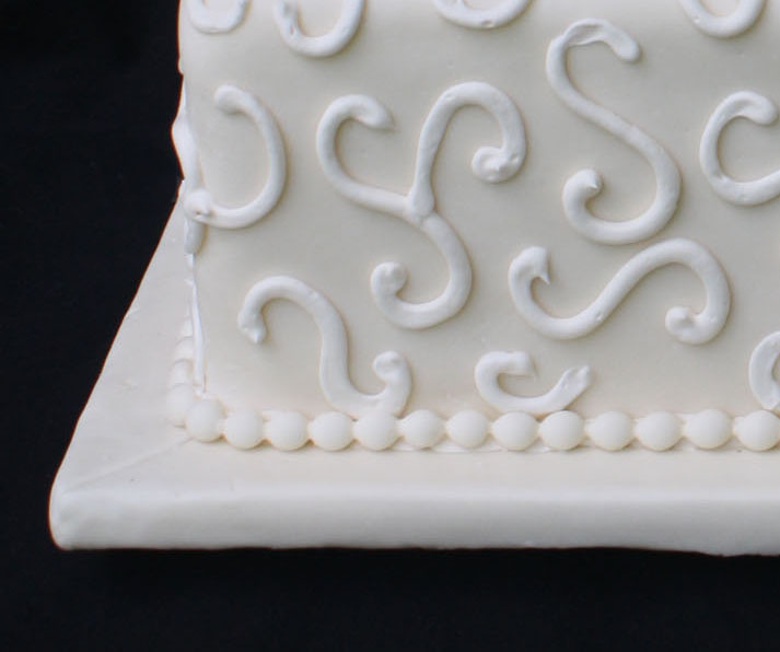 An Ivory and Teal Wedding Cake An Ivory and Teal Wedding Cake