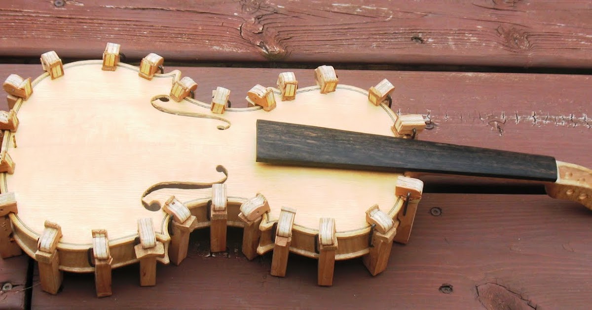 Ken's violin making Gluing the back on