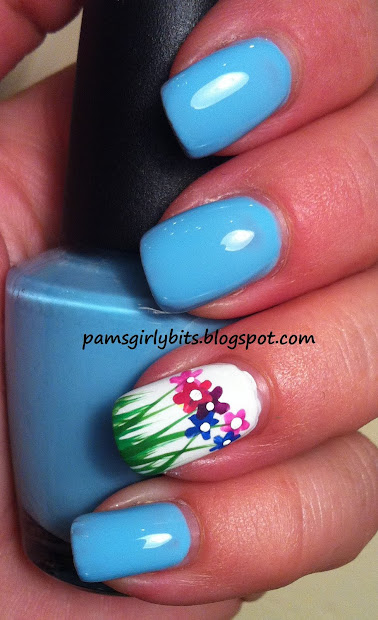 girly bits flowers in grass