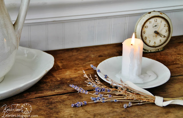 Antique Farmhouse Work Table with Lavender bundle an antique clock and drippy white candle via http://knickoftimeinteriors.blogspot.com/