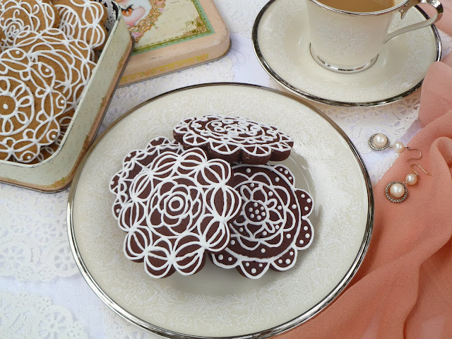femininely piped dark-chocolate tea biscuits, china, doilies