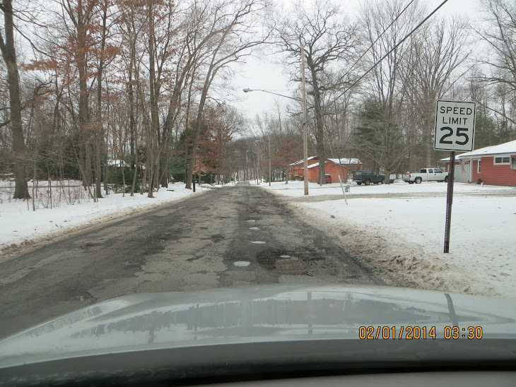 Yes this is 1 of many Brady Lake Village terrible streets. 25 MPH ? How about left of center ?