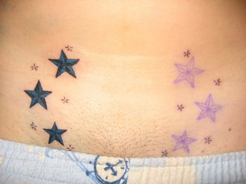 lower back tattoos stars Posted by heru at 843 AM