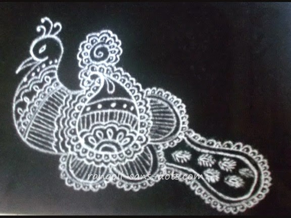 a completed bird design with a lot of decorations mehndi-rangoli-12c.jpg