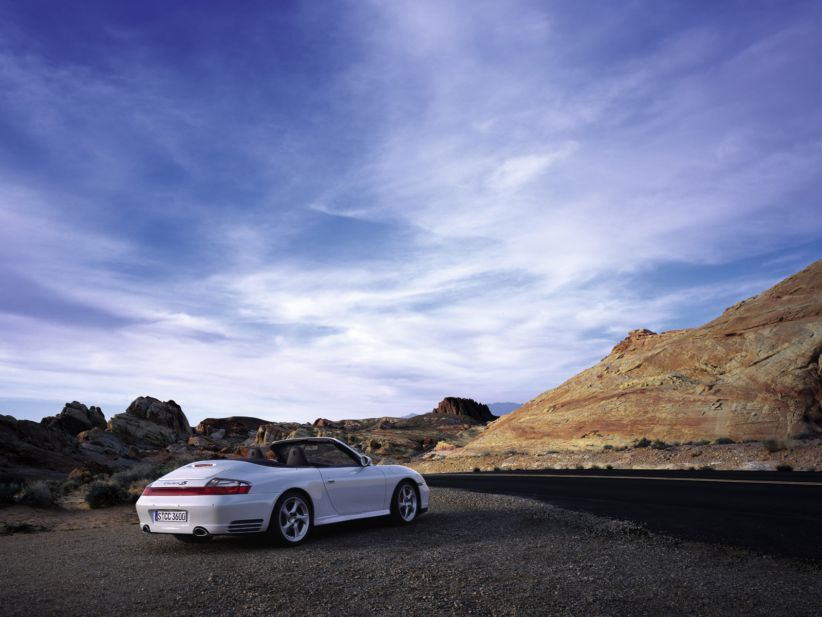http://4.bp.blogspot.com/-HtbESVrgLIw/T46S9Pn3O1I/AAAAAAAA1jo/UwFByCN7hO8/s1600/Porsche+996+911+Carrera+4S+Cabriolet+Cars+Wallpapers+(5).jpg