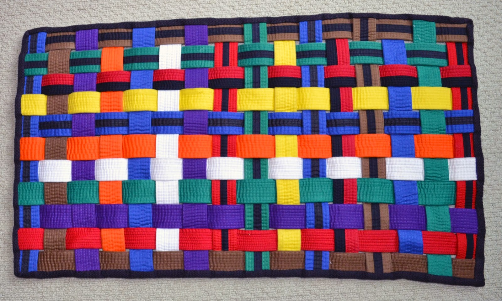 Rug out of Tae-Kwon-Do Belts