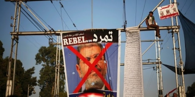Bayi Ini Lahir di Saat Demo Anti-Presiden Mursi Demo Anti-Presiden Mursi
