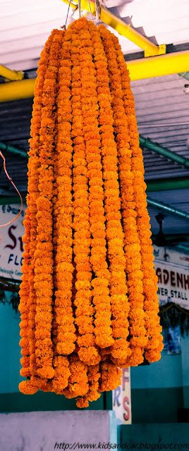 Marigold flowers garland in Gudimalakpur flower market hyderabad