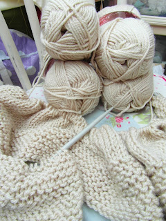 Hand knitted snuggly blanket in progress made By Laura Ann