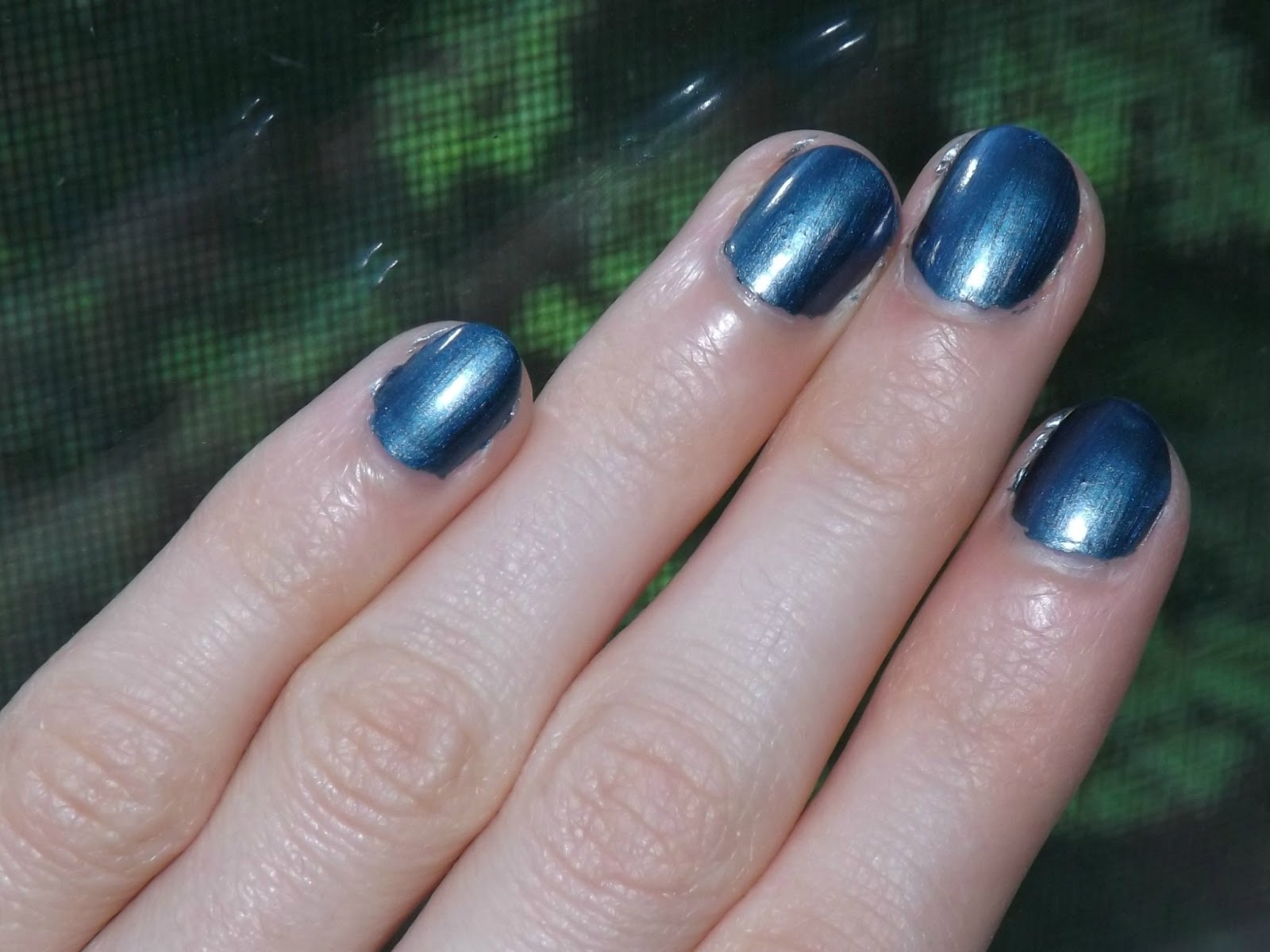 Perfectly Polished 12 Sally Hansen "Ionic Indigo"