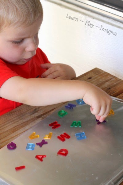 How to make a sticky alphabet tray for learning letters through sensory play.