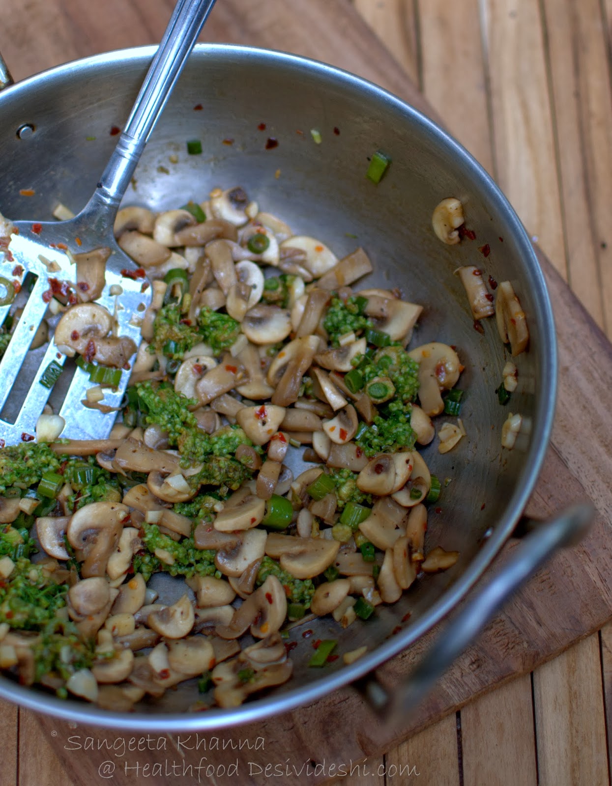a quick stir fry with onion blossoms and button mushrooms