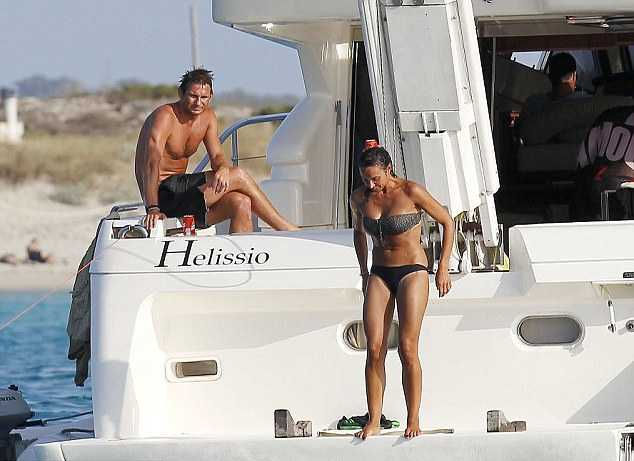Lampard shows his playfull wresting with Christine Bleakley off their yacht