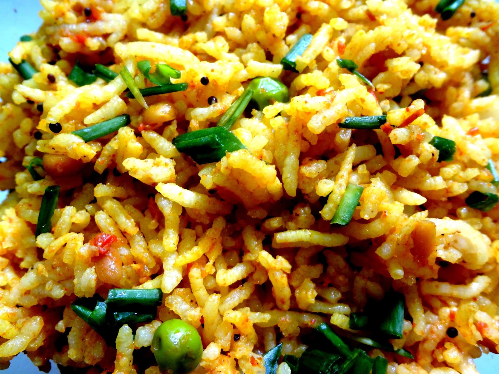 Tomato Rice with spring onions and green peas.