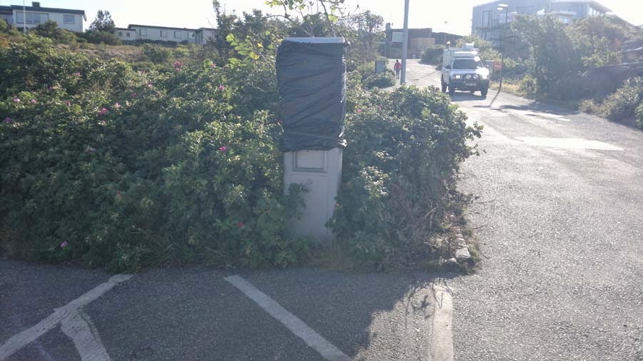 Parking lot meter has broken down. Black bag over it. Parking lot meter has broken down. Black bag over it.