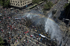 Chileans go on strike as protest death toll hits 18