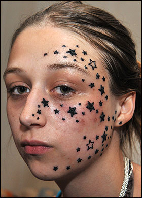 Tatto on Girls Face Tattoo Design Photo Gallery   Face Tattoo Ideas For Girls