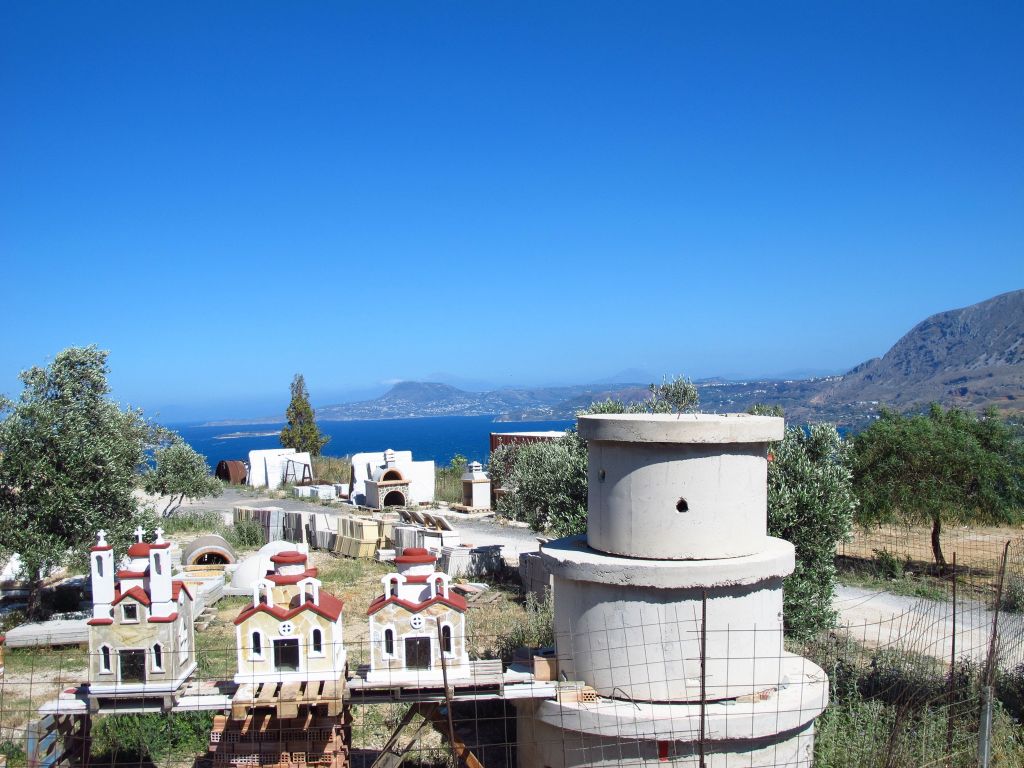 view-through-bus-towards-the-sea-crete-photo-by-susan-wellington view-through-bus-towards-the-sea-crete-photo-by-susan-wellington