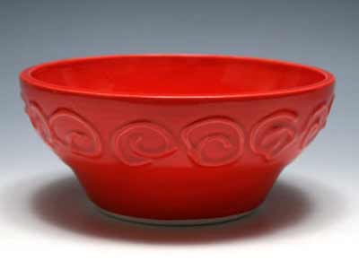 a red bowl red bowls