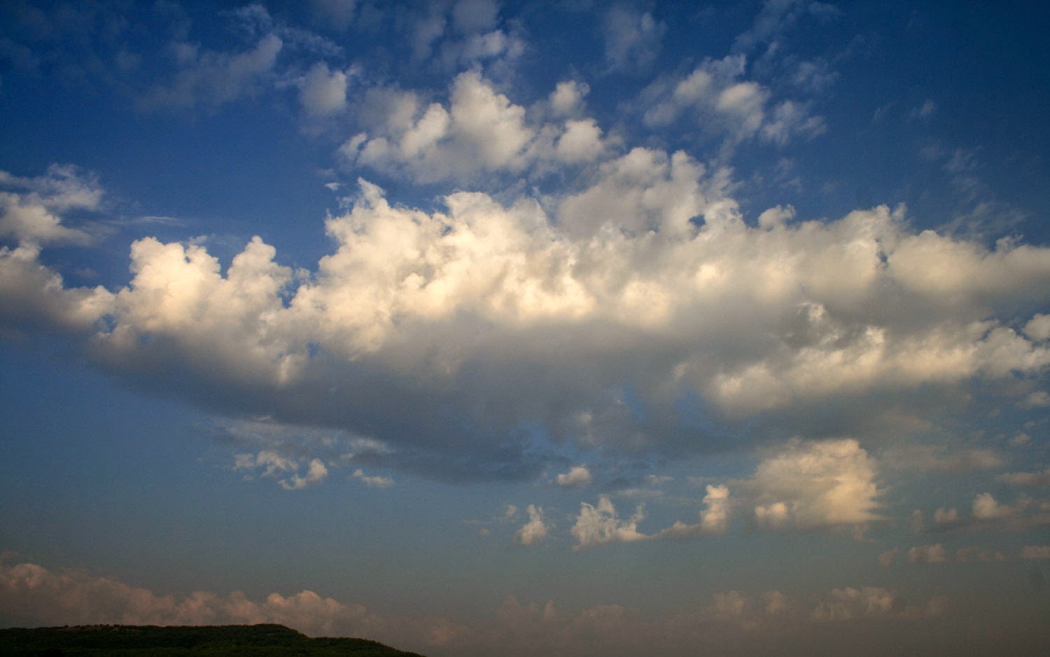 Clouds indicate a slightly cooler day Clouds indicate a slightly cooler day
