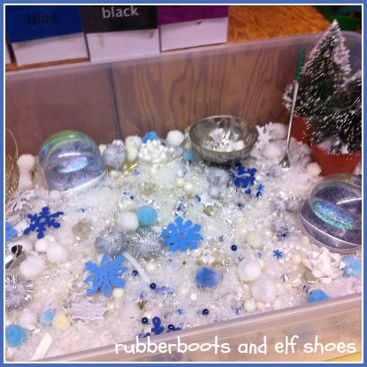 winter sensory bin - rubber boots and elf shoes