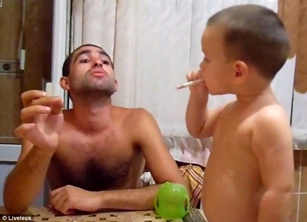  Father Shows His 3 Year Old Son How To Smoke Cigarettes While His Mother Tapes It [Photos + Video]