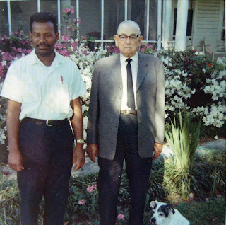 Colored photograph of Howard family relative Bruce Douglas. Unknown person on left.