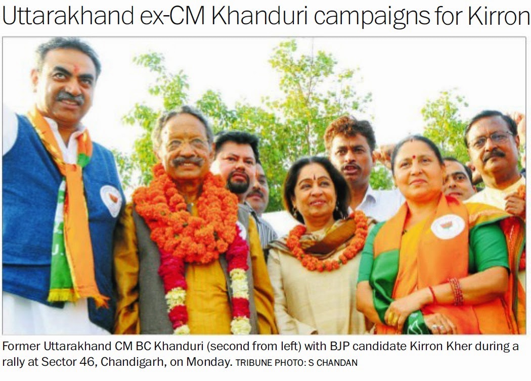 Former Uttarakhand CM BC Khanduri with BJP candidate Kirron Kher & Ex-MP Satya Pal Jain during a rally at Sector 46, Chandigarh, on Monday. Tribune Photo. S Chandan
