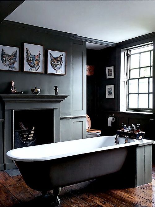 gorgeous black bathroom with cat painting