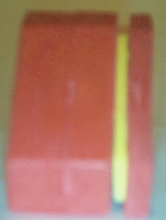 Another side view of Superman S shield pencil top eraser from vending machine Another side view of Superman S shield pencil top eraser from vending machine
