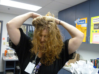 We started with a wreath and had to start pinning our hair around it. Fortunately, I have tons of hair, as you can see. We started with a wreath and had to start pinning our hair around it. Fortunately, I have tons of hair, as you can see.