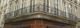 Balcon sur l'angle du 54 rue Saint-Honoré et 1 rue des Prouvaires à Paris