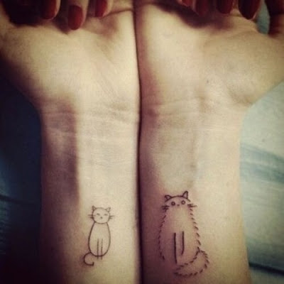 TATUAJES DE GATOS EN ANTEBRAZO