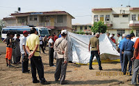 Trekkers during tent pitching demonstration.