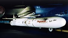 Pegasus rocket mated under the wing of B-52 mothership