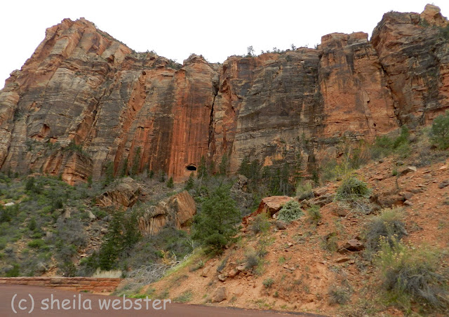 There is an opening in the side of the mountain which is part of the tunnel