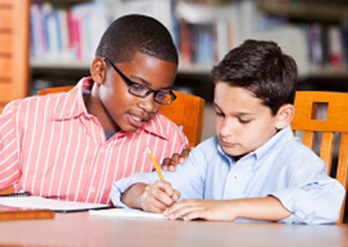NAMC Montessori and RTI response to intervention. Boys writing together