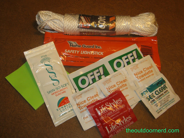 Car Survival Kit: Rope, Light Stick, lotion, condom, bug repellent, post-it notes and towelettes Car Survival Kit: Rope, Light Stick, lotion, condom, bug repellent, post-it notes and towelettes