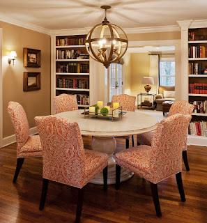 Black Round Dining Tables for Various Dining Room Designs Wonderful Details in the Dining Room with Round Dining Tables and Artistic Chairs under the Rounded Chandelier